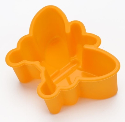 Conception de mouche à beurre d'accessoires de vaisselle de cuisine de moules de gâteau de silicone de Nolvety