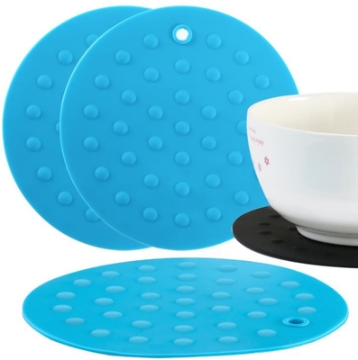 Les batteries de cuisine en caoutchouc rondes, tapis de cuisson de silicone de relief pointille le style
