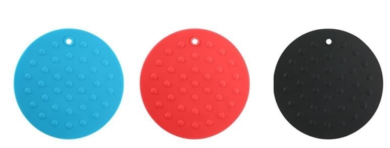 Les batteries de cuisine en caoutchouc rondes, tapis de cuisson de silicone de relief pointille le style