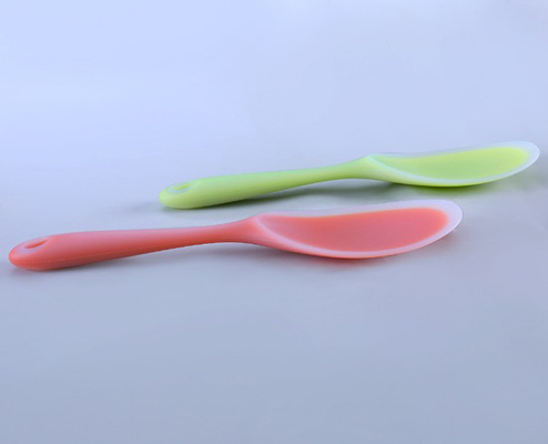 Le riz de silicone de catégorie comestible administre des outils à la cuillère de cuisine avec la couleur translucide